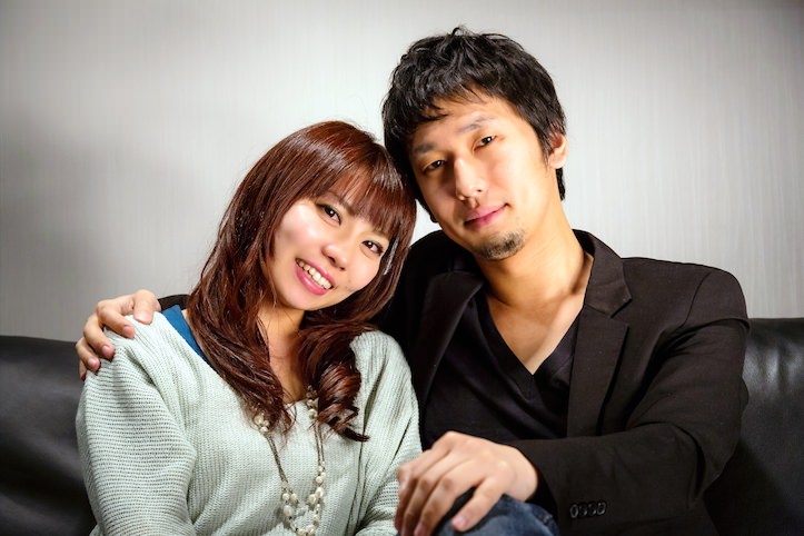 Man and woman looking happy