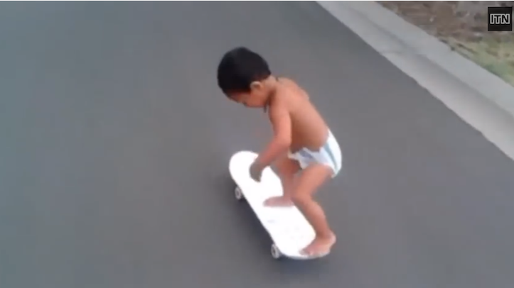 Skateboarding toddler