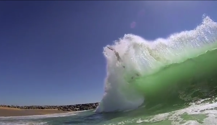 Body boarder eaten by wave