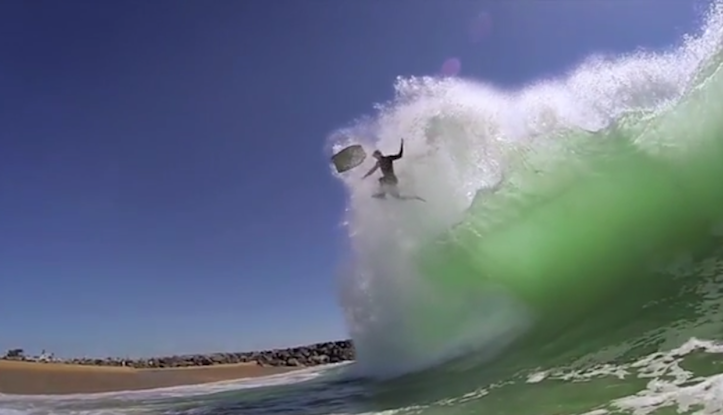 Body boarder eaten by wave