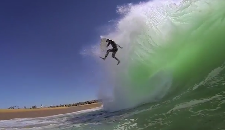 Body boarder eaten by wave