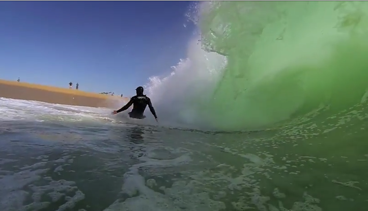 Body boarder eaten by wave