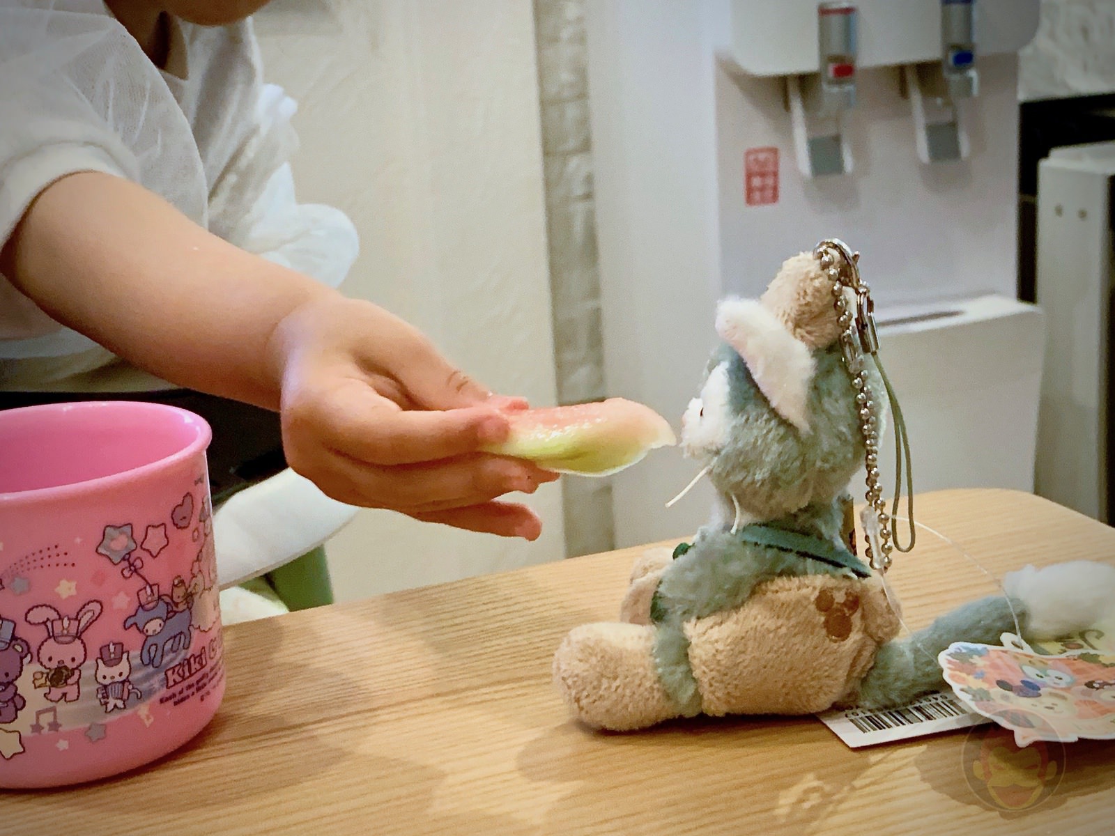 My Daughter giving food to dolls 01