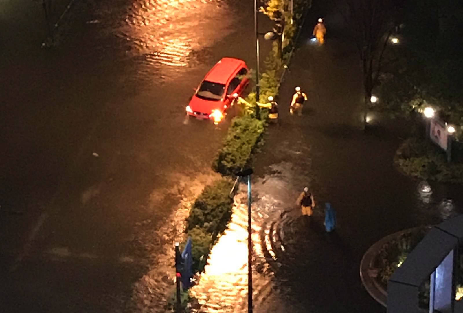 Car trapped in flood